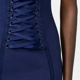 Abito in crêpe stretch con lacci criss-cross