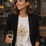 T-shirt bianca in cottone con fiore applicato