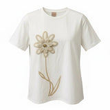 T-shirt bianca in cottone con fiore applicato